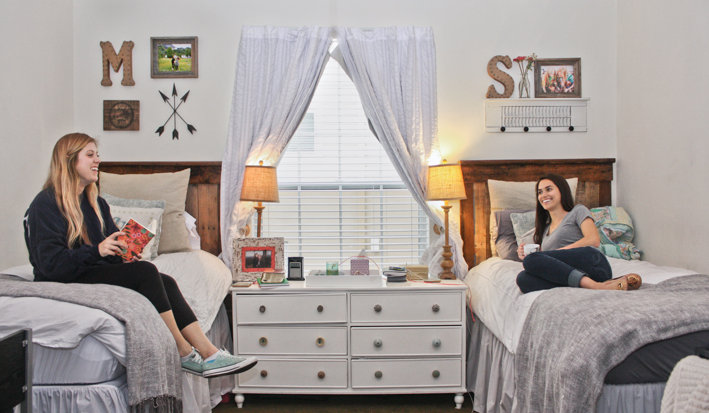 UF Sorority freshman girls relaxing in their luxury double dorm room
